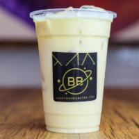 Oolong Milk Tea · Light oolong tea with floral and fruity notes blended with dairy-free creamer and sweetener