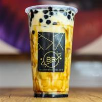Brown Sugar Milk Tea · Our Classic Milk Tea lined with sweet Caramel Walls and fresh brown sugar boba flavored with...