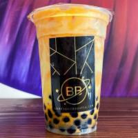 Tiger Thai Tea · Freshly brewed Thai tea sweetened with condensed milk, tiger walls, and chewy brown sugar boba