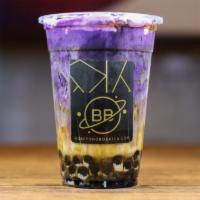 Ube Flurple Dream Milk Tea · A creamy Ube blend with your choice of milk, brown sugar walls and boba, then topped with fl...