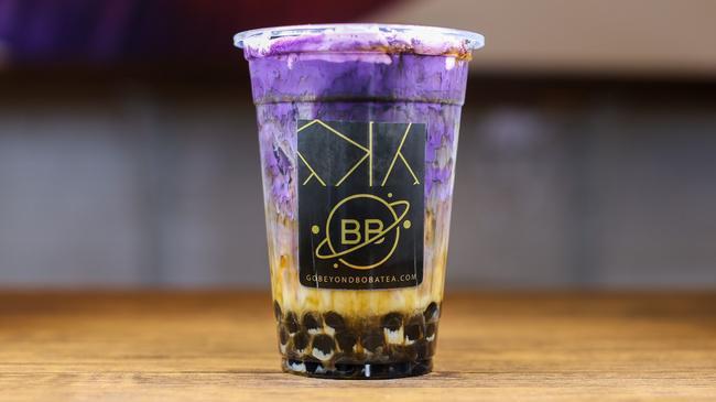 Ube Flurple Dream Milk Tea · A creamy Ube blend with your choice of milk, brown sugar walls and boba, then topped with fluffy ube cream