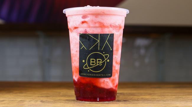Strawberry Smoothie · Sweet strawberry flavor ice-blended with milk and layered over strawberry jam and strawberry walls