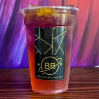 Shooting Stars Lemonade · Butterfly pea tea blended with raspberry lavender lemonade and topped with mango star jellies