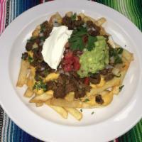 Loaded Steak Fries  · Crispy french fries, in-house cheddar cheese sauce, your choice of chicken, por, or steak, o...