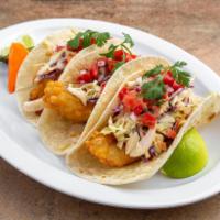 Fish Taco · fresh deep fired fish in house made beer batter, blackened jalapeno mayo coleslaw (not Spicy...