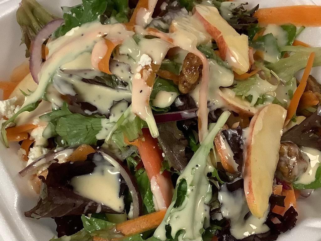 Green leave salad  · Mix greens, sweets walnuts, shaved carrots, red onions, goat cheese, and sliced apples. honey mustard