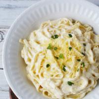 Penne Alfredo · Heavy cream and Parmesan cheese. 