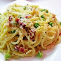 Spaghetti Carbonara · Pancetta, peas and shallots in a cream sauce.