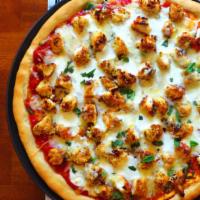 Chicken Parmesan Pizza · Crispy chicken, tomato sauce, and mozzarella cheese. 