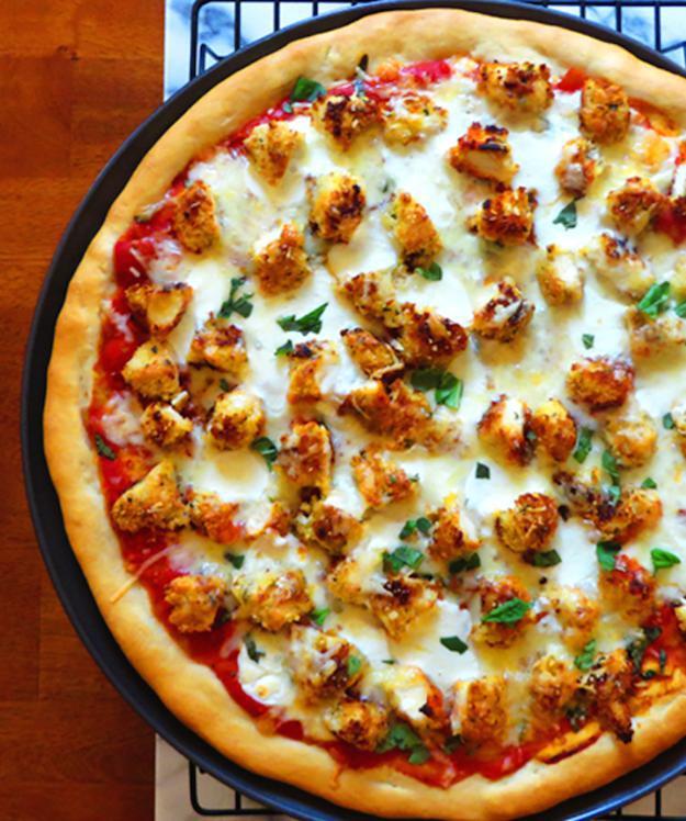 Chicken Parmesan Pizza · Crispy chicken, tomato sauce, and mozzarella cheese. 