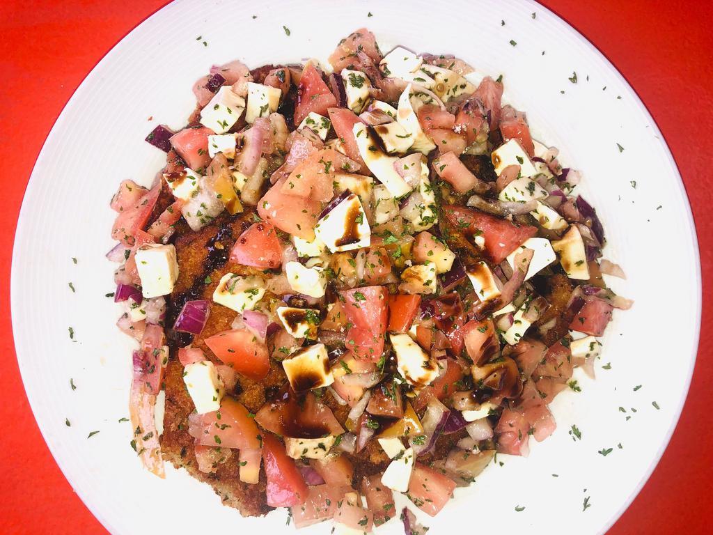 Chicken Bruschetta · Fried chicken, topped with tomato, red onion, and fresh mozzarella tossed in balsamic and oil.