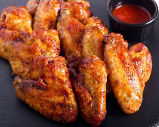 BBQ Chicken Wings · Fresh oven-baked chicken wings smothered in sweet tangy barbeque sauce.