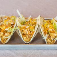 Chicken Tacos · SEASONED CHICKEN, CHEESE, LETTUCE & SWEET CHIPOTLE SAUCE SERVED IN YOUR CHOICE OF CORN TORTI...