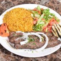 Kifta Kabab · Ground beef and lamb, mixed with fresh chopped parsley and onions, formed and grilled with o...