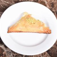 Baklava · A Middle Eastern pastry composed of nuts, spices and honey, blanketed between layers of swee...