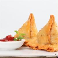 2 Piece Vegetable Samosa · Crispy turnover stuffed with tender vegetables seasoned with traditional Indian spices with ...