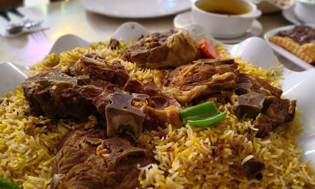 Lamb Biryani · Hearty rice loaded with tender lamb, hearty vegetables and fresh spices. Gluten free.