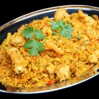 Shrimp Biryani · Hearty rice loaded with tender prawns, hearty vegetables and fresh spices. Gluten free.