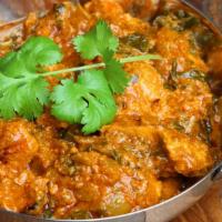 Chicken Tikka Saagwala · Tender white meat chicken, spinach and broccoli cooked in a creamy tomato based curry and fl...