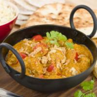 Lamb Curry · Hearty lamb in a traditional savory curry served with a side of basmati rice. Gluten free.