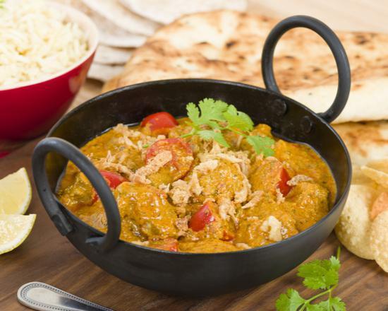Lamb Curry · Hearty lamb in a traditional savory curry served with a side of basmati rice. Gluten free.