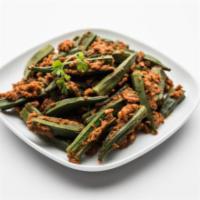 Bhindi Masala · Tender okra sauteed in onions and tomatoes and served with a side of basmati rice. Vegan. Gl...
