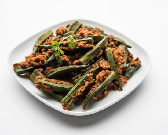 Bhindi Masala · Tender okra sauteed in onions and tomatoes and served with a side of basmati rice. Vegan. Gluten free.