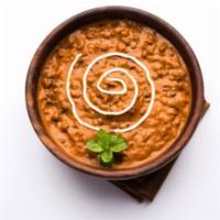 Dal Makhni · Tender lentils stewed in a creamy curry and served with a side of basmati rice. Gluten free.