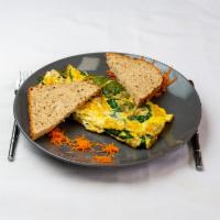 Greek Omelette Sandwich · Feta cheese, tomatoes and spinach.