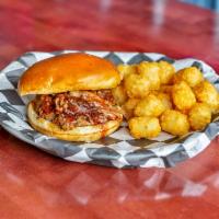 Pulled Pork Sandwich · Slow-cooked pulled pork with Jed's honey BBQ sauce served on a bun.