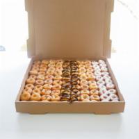 Box of 100 TLD · What a sweet deal! A customized box of 100 tiny little donuts. Choose any of our flavors for...