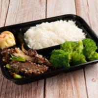 Korean Bulgogi Beef Rice · Served with Broccoli, onion, scallion,  dumpling and bulgogi sauce.