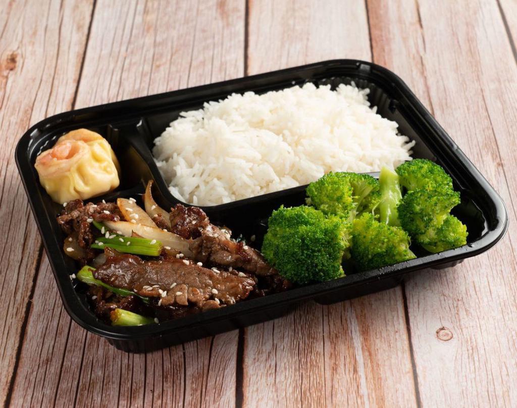 Korean Bulgogi Beef Rice · Served with Broccoli, onion, scallion,  dumpling and bulgogi sauce.