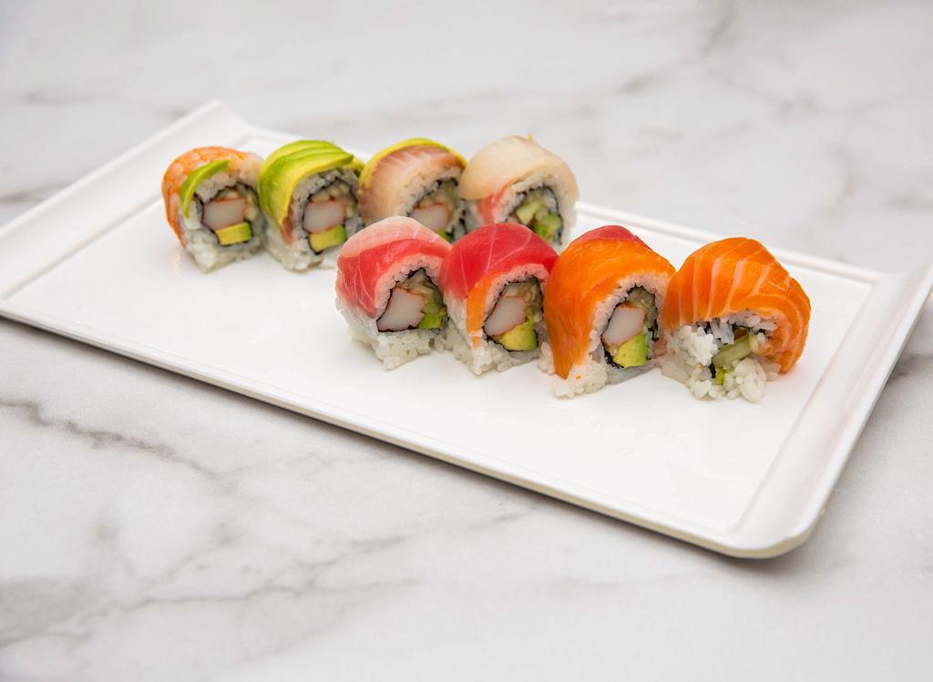 Rainbow Roll · Imitation crab, avocado, cucumber and topped with assorted sashimi.