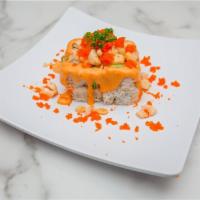 Volcano Roll · Imitation crab, avocado, cucumber and topped with baked scallops, masago, spicy mayo and ses...