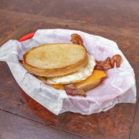 Sprindale Sourdough Sandwich · Egg, choice of protein: bacon, sausage, ham, or vegan sausage, sourdough bread.