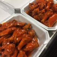 Family Pack · Five dozen wings mix with a side of carrots and one 8oz Dip, one dinner salad , two French f...