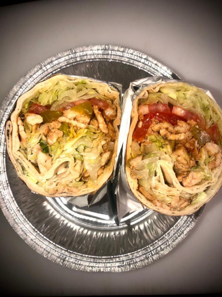 Chicken gyro On Pita  · Chicken gyro on Pita, Lettuce Tomato and Pickles, white Sauce 