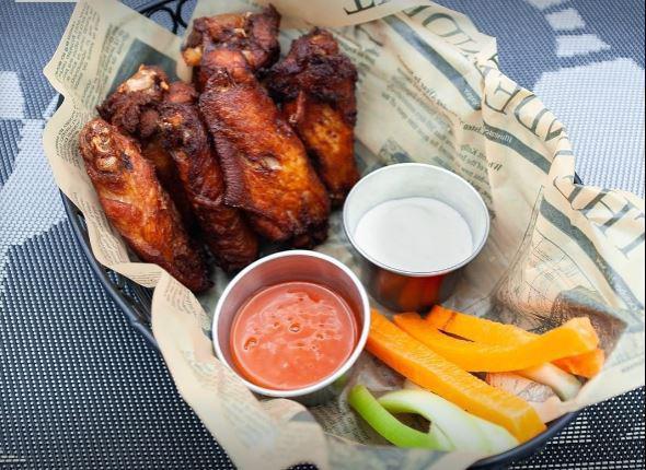 Buffalo Wings · Served with blue cheese, celery, and carrots.
