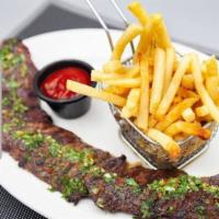 Churrasco · Grilled skirt steak with chimichurri sauce with choice of 1 side order.

