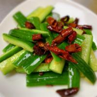 Spicy Cucumber呛黄瓜 · Cucumber mixed with dressing. 