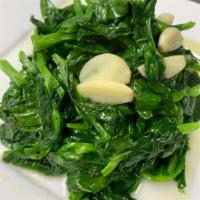 Sauteed Pea Sprouts with Garlic炒豆苗 · None Spicy