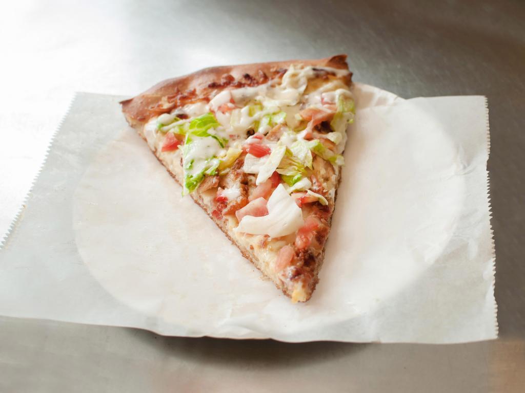 Large Chicken Bacon Ranch Pizza · Ranch base, lettuce, tomato, bacon and chicken.