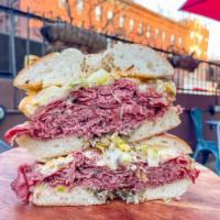 8. BB Reuben  · Hot pastrami, melted Swiss, caramelized onions, iceberg lettuce, Russian dressing. 