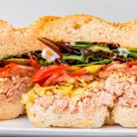 19. Spicy Tuna  · Genova tuna in olive oil, crushed BBQ chips, cherry peppers, tomato, mesclun, mayo.