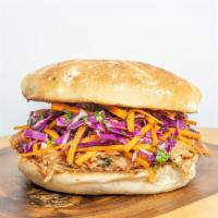43. BBQ Pulled Chick · Pulled chicken marinated in BBQ sauce, cilantro, red cabbage slaw