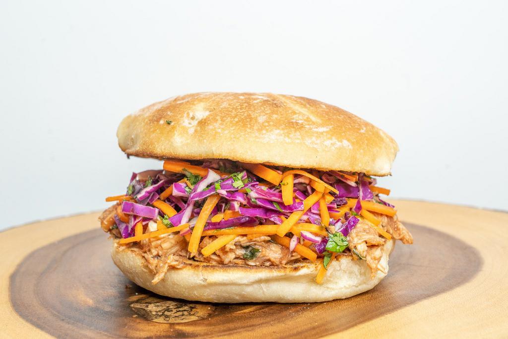 43. BBQ Pulled Chick · Pulled chicken marinated in BBQ sauce, cilantro, red cabbage slaw