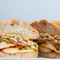 44. Chicken Club Sandwich · Chicken, melted cheddar, bacon, avocado, tomato, onion, iceberg lettuce, Sriracha mayo.