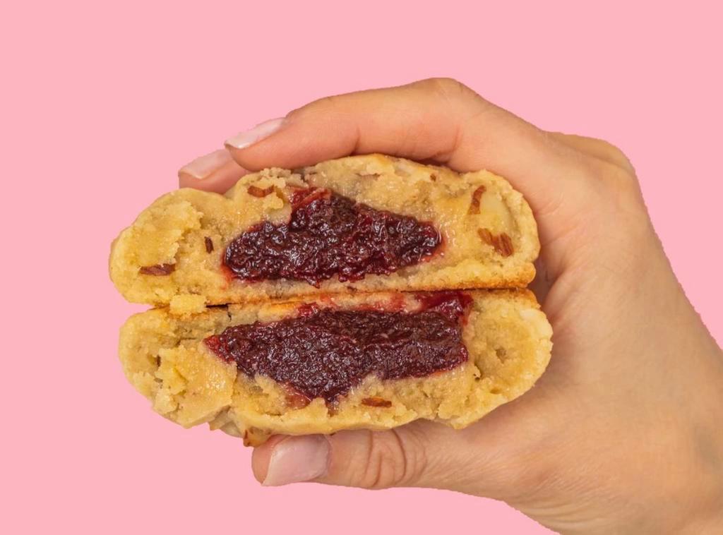 Raspberry Almond Duchess · Crispy almond cookie stuffed with delicious raspberry jam.
