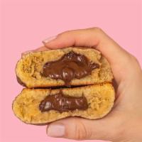 Churro Nutella Duchess · Snickerdoodle cookie stuffed with nutty and creamy nutella.